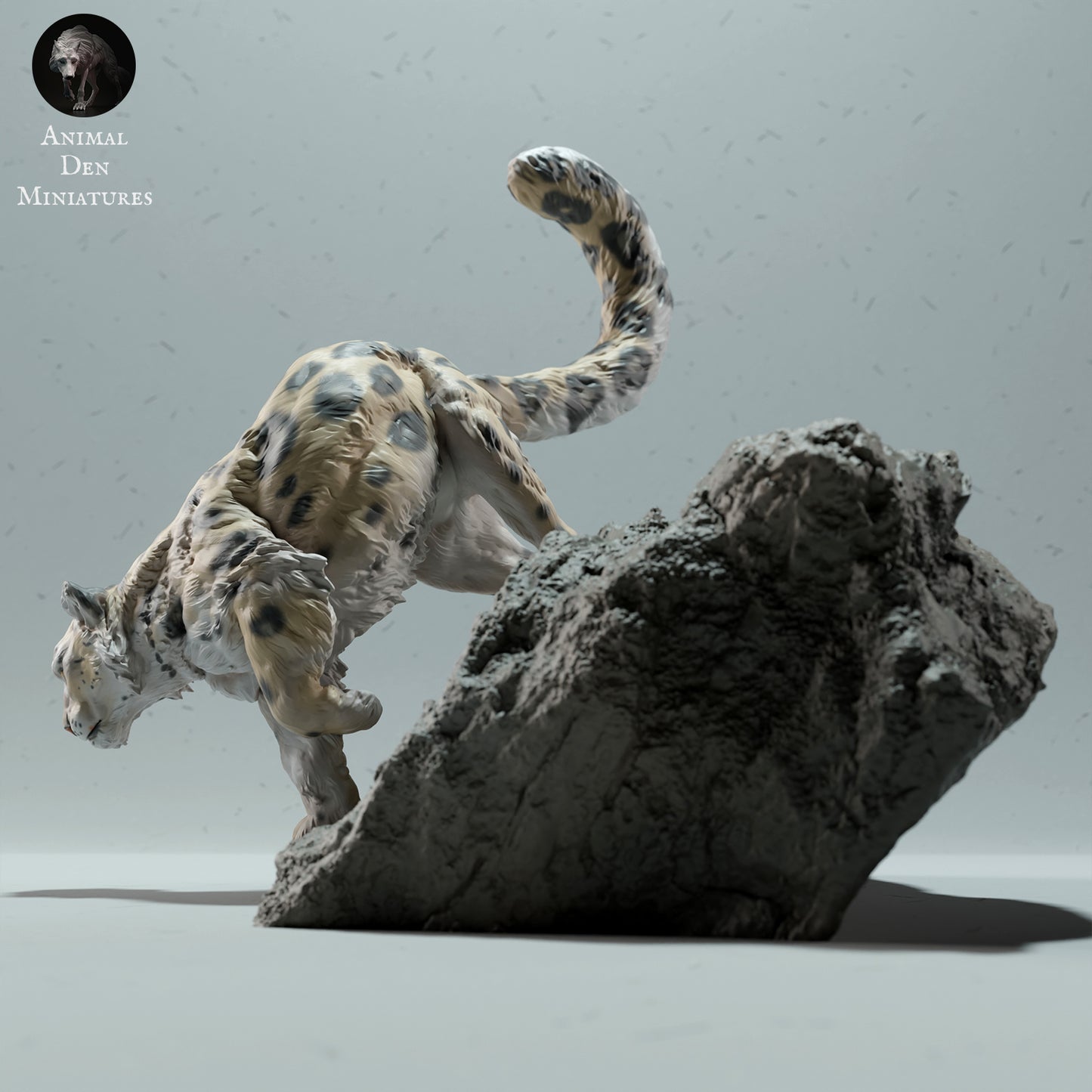 Snow Leopard on a Boulder - Animal Den Miniatures